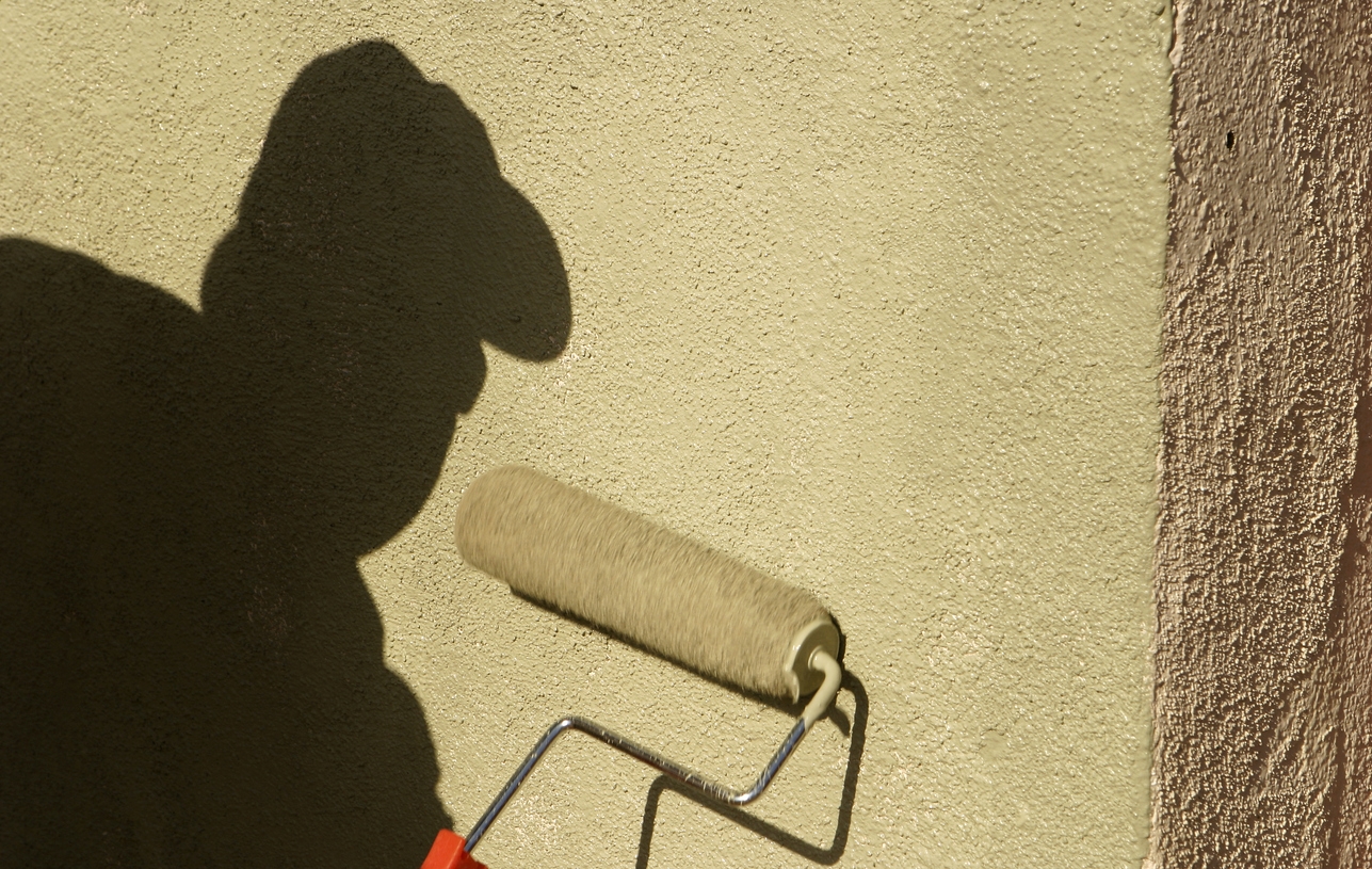 Painting the exterior stucco of a Dublin, CA home