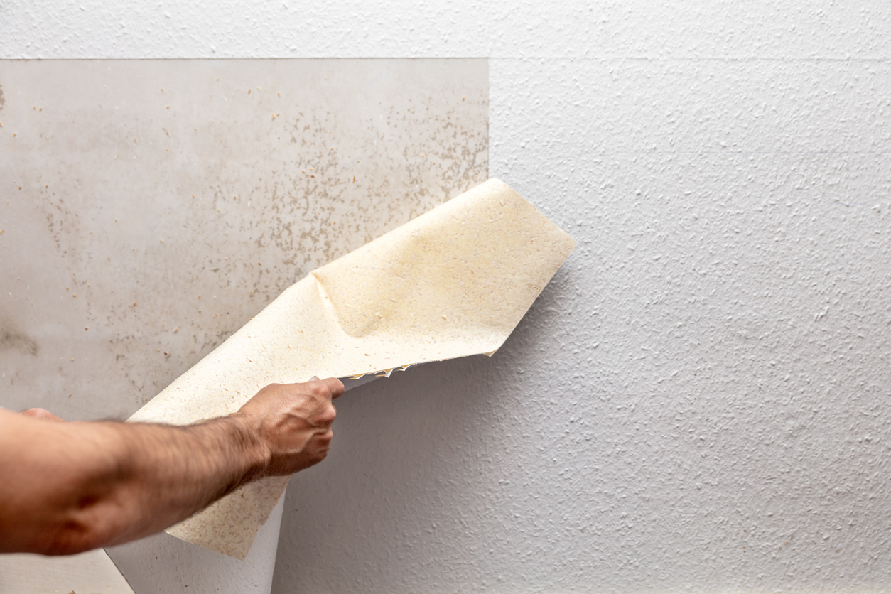 Wallpaper being removed in a Mountain House area business