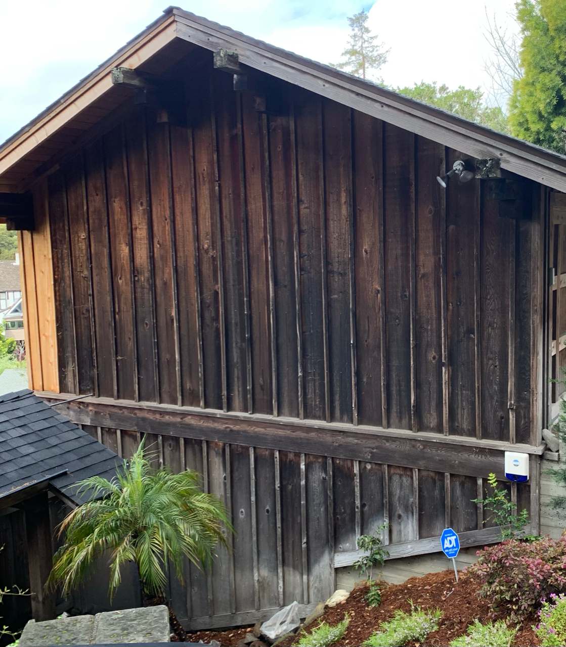 Before view of a Livermore area home wood siding before being professionally stained