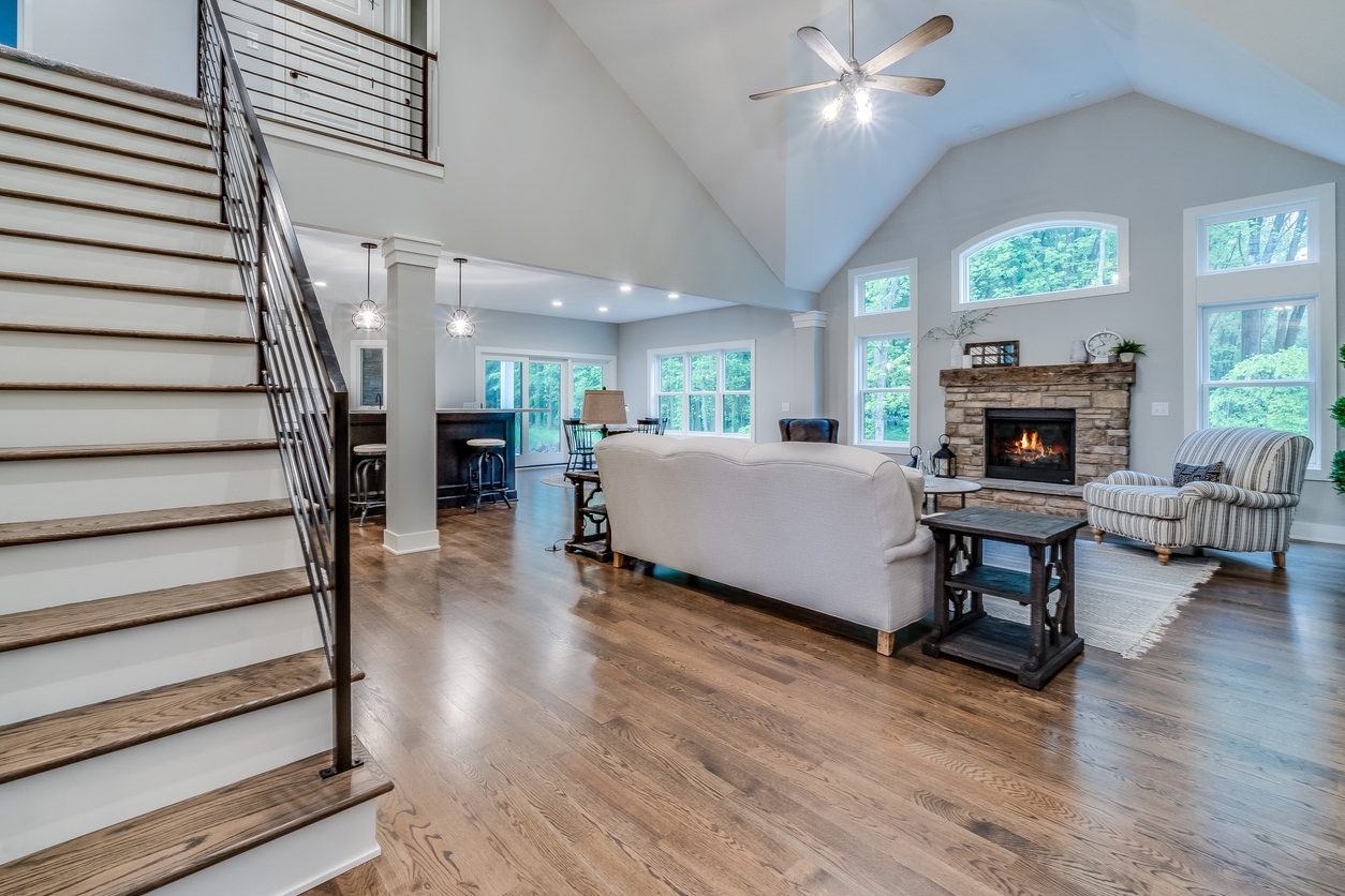 Front entrance and staircase leading to second story in a Mountain House area home